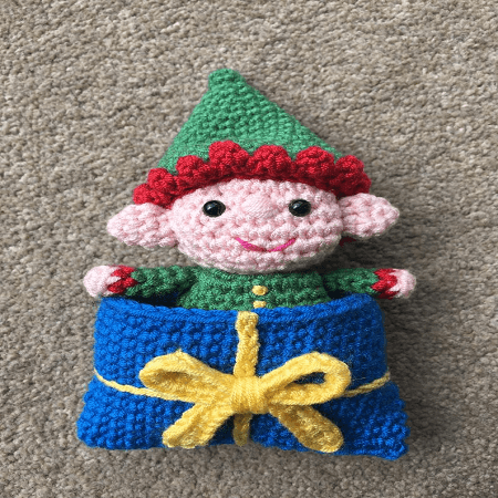 Elf In A Present Sleeping Bag Crochet Pattern by Lau Loves Crochet