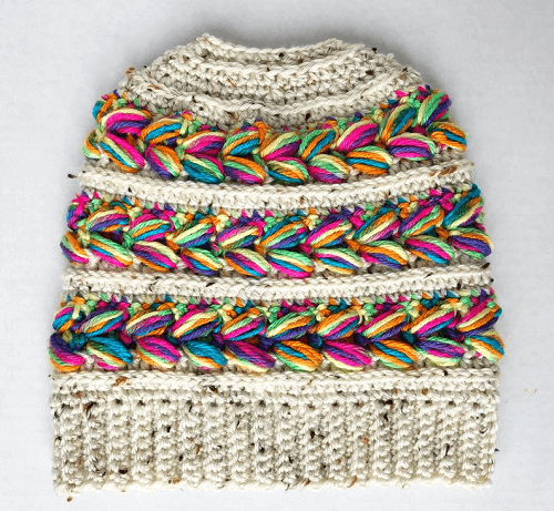 Rainbow Crochet Messy Bun Hat Pattern by Purple Mache 