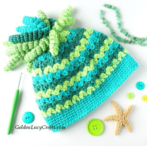 Spiral Top Messy Bun Hat Crochet Pattern by Golden Lucy Crafts