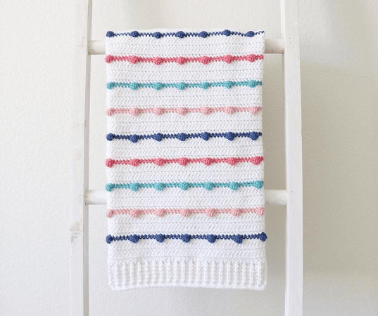 Crochet Bobble Lines Baby Blanket Pattern by Daisy Farm Crafts
