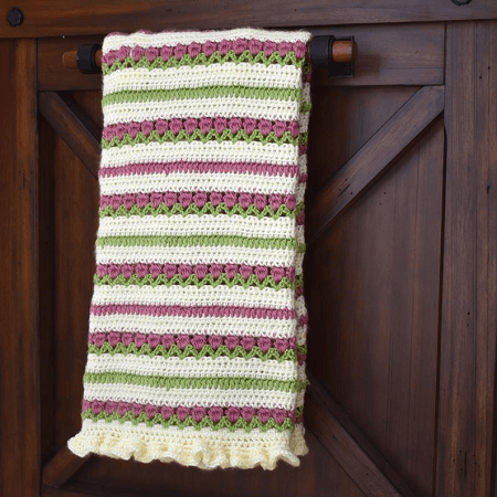 Ruffled Rose Garden Baby Blanket Crochet Pattern by The Wannabe Grandma