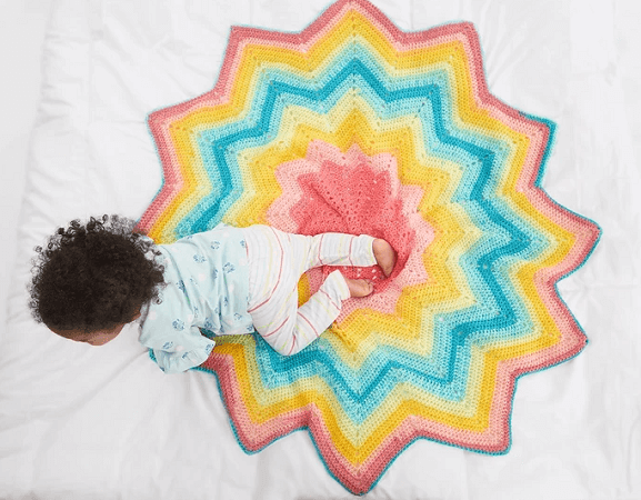 Starburst Crochet Baby Blanket  Pattern by Lion Brand Yarn