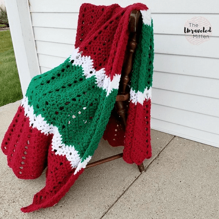 Merry And Bright Crochet Throw Pattern by The Unraveled Mitten