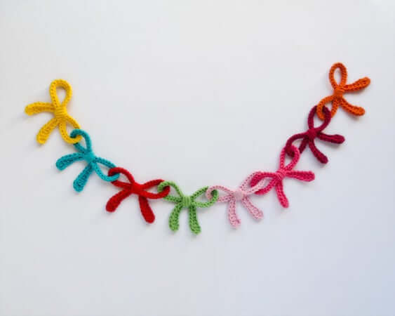 Crochet Colorful Bows Garland Pattern by One And Two Company