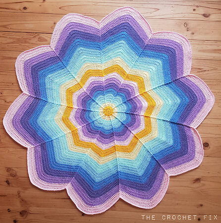 Spoke Flower Blanket Crochet Pattern by The Crochet Fix