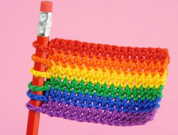 Free Crochet Rainbow Flag Pencil Topper Pattern by Gathered