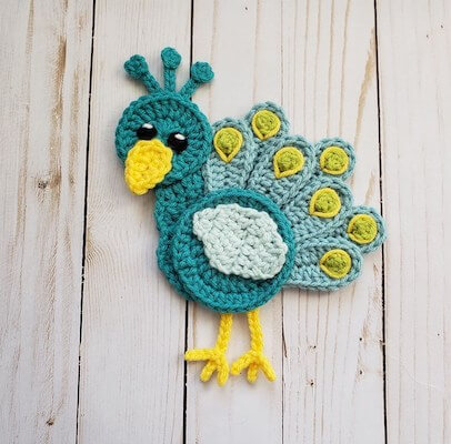 Crochet Peacock Applique Pattern by The Yarn Conspiracy
