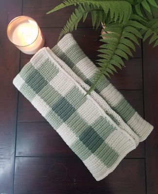  10. Green Unisex Gingham Crochet Baby Blanket Pattern by The Loophole Fox