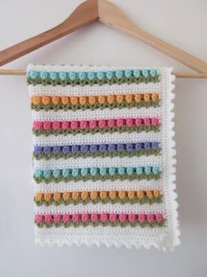 Crochet Tulip Blanket Pattern by Addie's Knitted Gifts