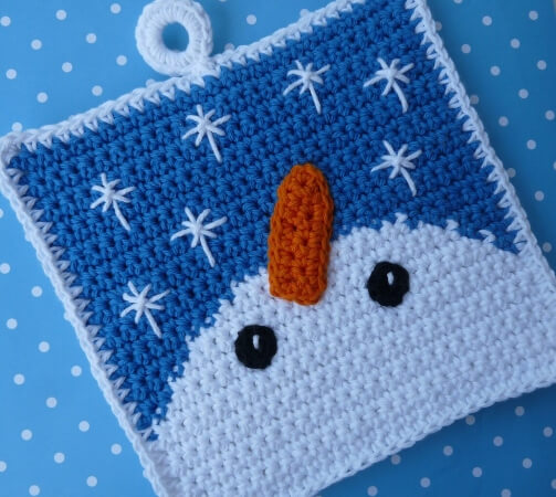 Snowman Gazing at Snowflakes Potholder Crochet Pattern by WhiskersAndWool