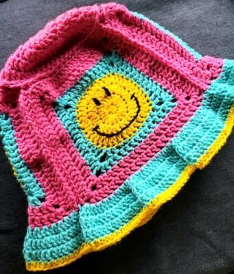 Smiley Granny Square Bucket Hat Crochet Pattern by Fuzzy Wuzzy Patterns
