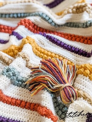 Bobbles And Stripes Blanket Crochet Pattern by Stitchery And Co