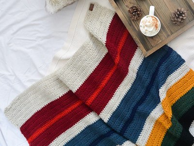 Cabin Stripes Blanket Crochet Pattern by Mama In A Stitch