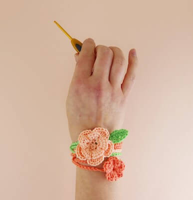 Quick Crochet Floral Wrist Wraps Pattern by Irene Strange