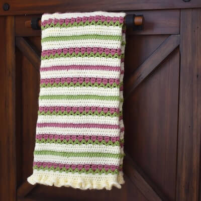 Ruffled Rose Garden Crochet Baby Blanket Pattern by The Wannabe Grandma