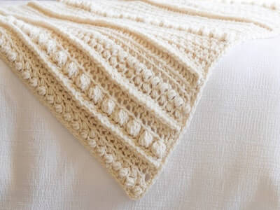 Wintertide Chunky Crochet Blanket Pattern by Mama In A Stitch