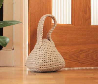 Crochet Pyramid Doorstop Pattern by Veronika Cromwell