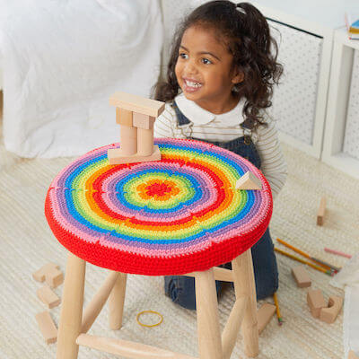 Crochet Rainbow Burst Stool Cover Pattern by Red Heart