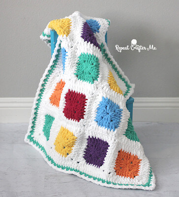 Bright And Bulky Bernat Blanket Pattern by Repeat Crafter Me
