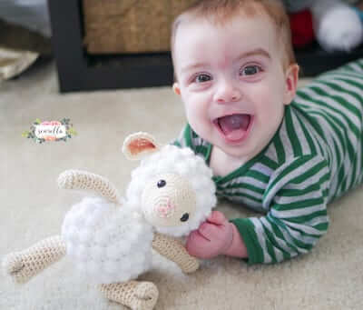 Crochet Lamb Baby Toy Pattern by Sewrella