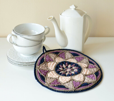 Stained Glass Mandala Potholder Crochet Pattern by Tatsiana Kupryianchyk