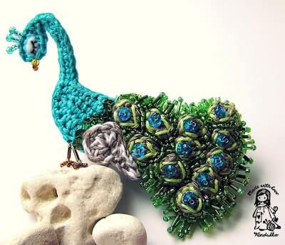 Crochet Peacock Brooch Pattern by Vendulka M