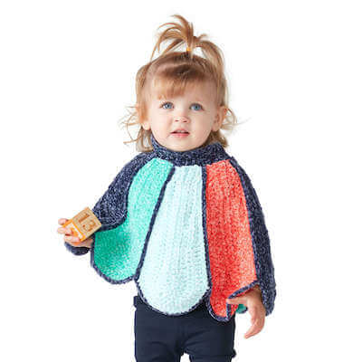 Crochet Petal Baby Poncho Pattern by Yarnspirations