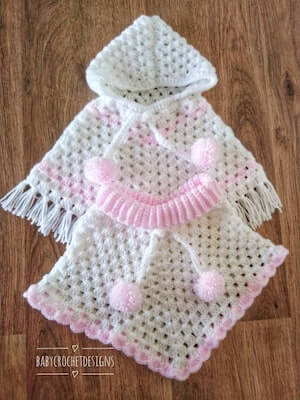 Granny Square Crochet Baby Poncho Pattern by Baby Crochet Designs UK