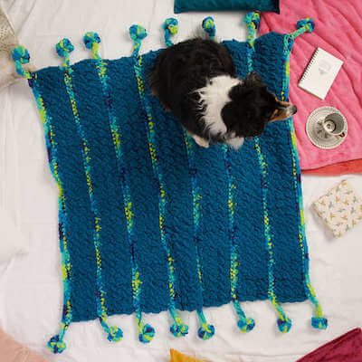 Big Poms Crochet Blanket Pattern by Yarnspirations