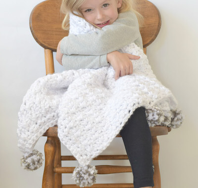 The Loft Pom Pom Baby Blanket Crochet Pattern by Mama In A Stitch