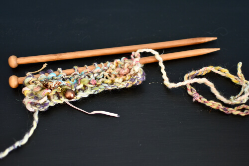 Knitting can be done with different types of needles