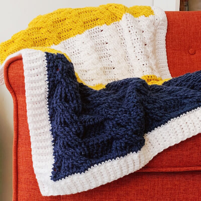 Beginner Crochet Cable Blanket Pattern by YHNFiberCo