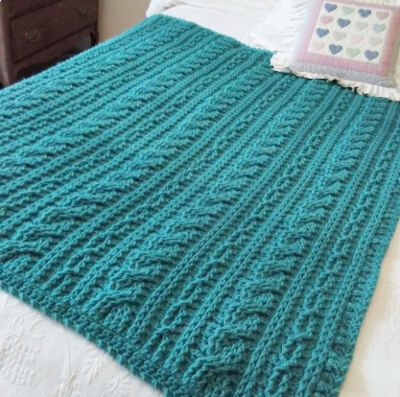 Calming Cable Blanket Crochet Pattern by CrochetPatternsNMore