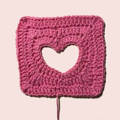 Crochet Heart Cut Out Granny Square Pattern by Heegeldus