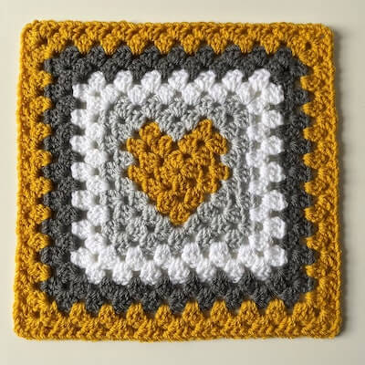 Heart Centre Granny Square Crochet Pattern by The Crocheted Cabin