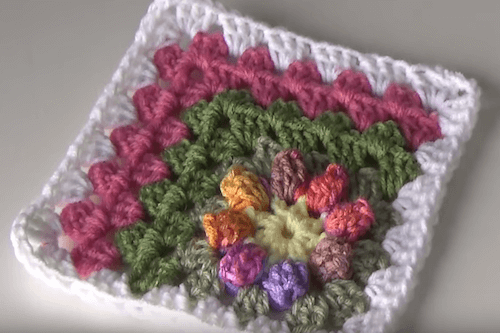 Crochet Daisy In The Corner Granny Square Pattern by Glenda Winkleman