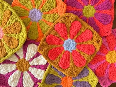 Retro Daisy Granny Square Crochet Pattern by Eat Pray And Crochet